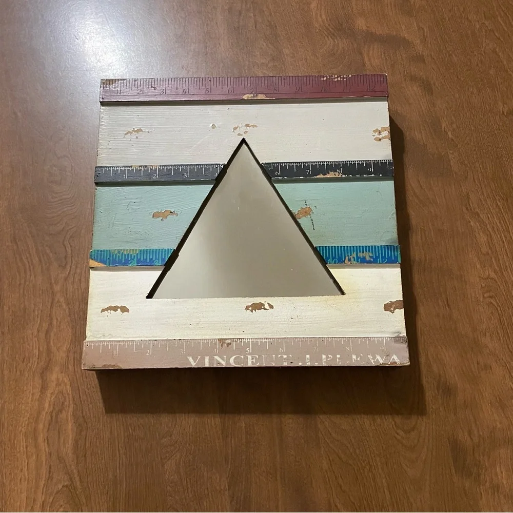 Triangle shaped mirror